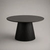 Table à manger ronde 120 x 75 cm noire en bois avec plateau rond et pied central cannelé