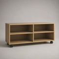 Meuble TV 180 x 40 x 50 cm beige clair en bois avec 4 niches ouvertes et roulettes noires